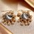 LUCKY JEWELLERY Gold Plated Black And White Color Meenakari Jhumki Earring For Girls & Women (125-CHJM1-1148-BLW)