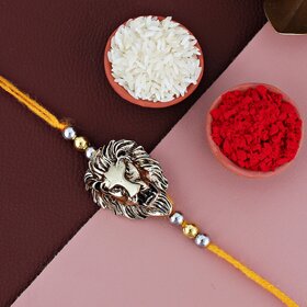 LUCKY JEWELLERY Oxidised Gold Lion Face Rakhi for Brother/Bhaiya/Bhai/Bhabhi - Pack of 1