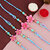 LUCKY JEWELLERY Pink Floral Rakhi for Brother/Bhaiya/Bhai/Bhabhi - Pack of 4