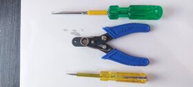 Strip cutter with screwdriver and tester