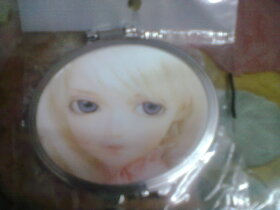 round shape travel mirror or purse mirror with twinkling eyes